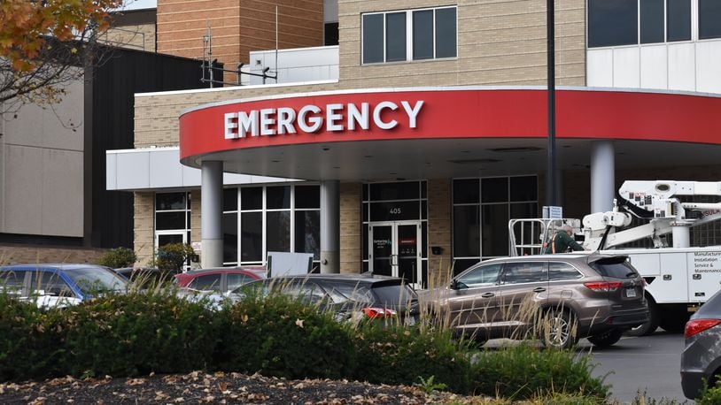 The entrance to the emergency room at Kettering Health Dayton. Proposed state legislation would add another category of "psychiatric deterioration" under which individuals with severe mental illness could be evaluated for involuntary treatment. The bill would also establish conditions under which a general hospital that receives a “mentally ill person subject to a court order” is not required to transfer the person to a hospital licensed by the Ohio Department of Mental Health and Addiction Services. SAMANTHA WILDOW\STAFF