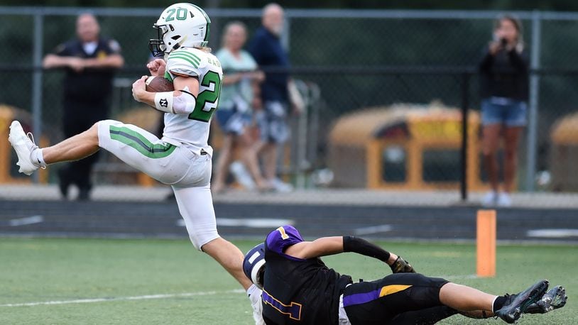 Badin's Jack Walsh heads to the end zone during the first half against Bellbrook on Friday, Aug. 27, 2021. Badin won 17-7. Nick Falzerano/CONTRIBUTED