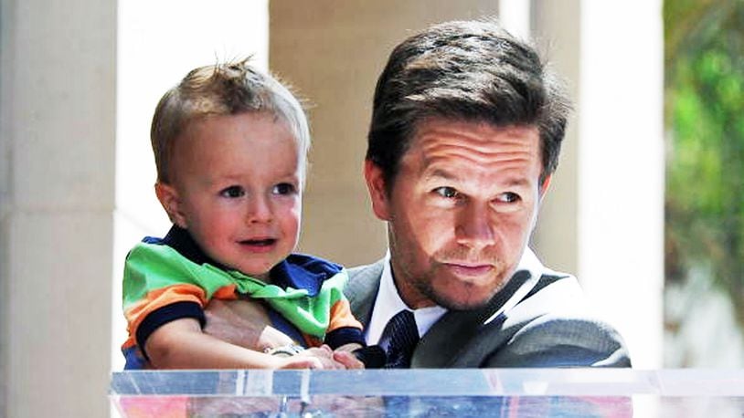 Actor Mark Wahlberg holds his son during his star ceremony on The Hollywood Walk Of Fame on July 29, 2010 in Hollywood, California. (Photo by Frazer Harrison/Getty Images)