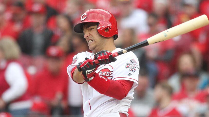 The Reds’ Jose Iglesias doubles in the seventh inning against the Pirates on Opening Day on Thursday, March 28, 2019, at Great American Ball Park in Cincinnati. David Jablonski/Staff