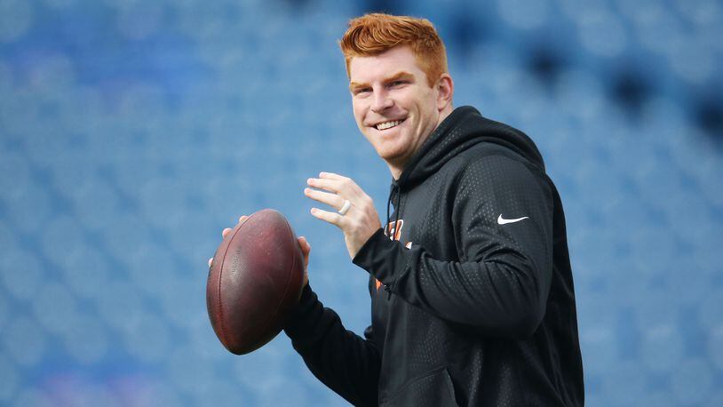 ORCHARD PARK, NY - OCTOBER 18:   Andy Dalton #14 of the Cincinnati Bengals warms up before the game against the Buffalo Bills at Ralph Wilson Stadium on October 18, 2015 in Orchard Park, New York.  (Photo by Tom Szczerbowski/Getty Images)