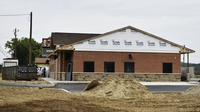 Construction on the new medical pot emporium in Seven Mile continues Monday, August 12. When completed, this will be one of two dispensaries in Butler County. The other dispensary will be located in Monroe. NICK GRAHAM/STAFF