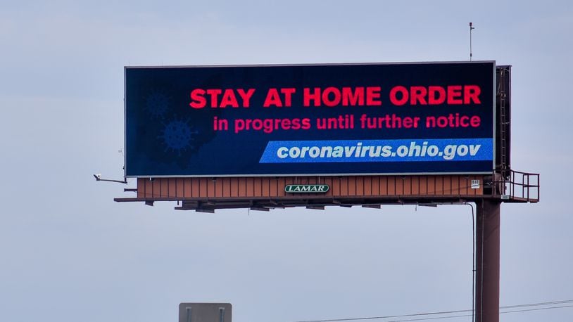 A billboard along Ohio 129 in Fairfield Township notifies drivers of the Stay At home Order in progress Tuesday, March 24, 2020. The governor put the order in place to slow the spread of coronavirus (COVID-10).
