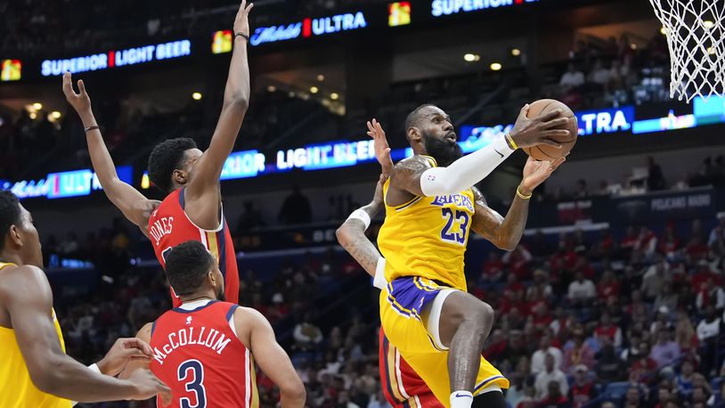 Los Angeles Lakers forward LeBron James (23) goes to the basket in the first half of an NBA basketball play-in tournament game against the New Orleans Pelicans, Tuesday, April 16, 2024, in New Orleans. (AP Photo/Gerald Herbert)