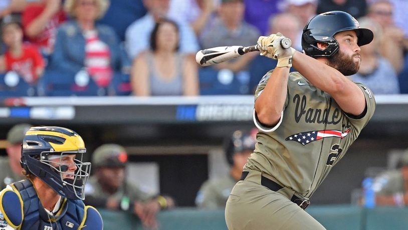 Vanderbilt's Ty Duvall singles in a run in the second inning against the Michigan Wolverines during game one of the College World Series Championship Series on June 24, 2019 at TD Ameritrade Park Omaha in Omaha, Nebraska.  (Photo by Peter Aiken/Getty Images)