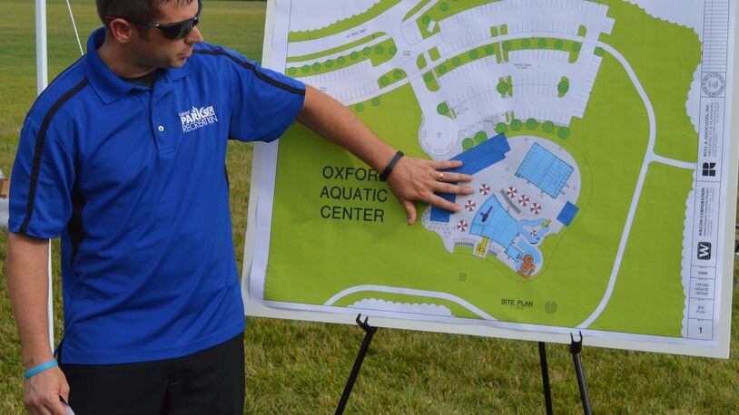 Oxford Director of Parks and Recreation Casey Wooddell describes what will be included in the city s new aquatic center at a groundbreaking ceremony Aug. 7.