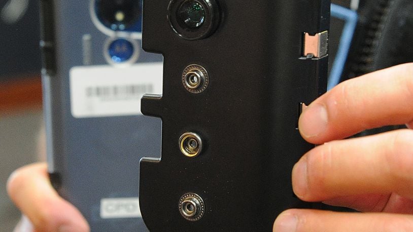 The new body worn cameras Clayton Police have started wearing. Clayton Police Chief Matthew Hamlin, said the body cameras will be worn by his officers while they are on duty. Two police agencies in Warren County, Lebanon and Franklin, are moving toward implementing body cameras in the near future. Lebanon City Council will consider the request at its Jan. 11 meeting. MARSHALL GORBY\STAFF