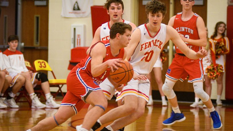 Fenwick’s A.J. Braun (20) defends Clinton-Massie’s Daulton Wolfe during Monday night’s game at Fenwick. The host Falcons won 67-48. ROB MCCULLEY/RAM PHOTOGRAPHY