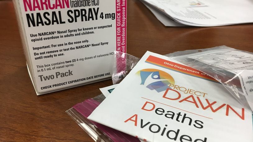Each naloxone kit distributed by Project DAWN includes a nasal spray device with two doses of 2 mg each of the overdose-reversing drug. Wider distribution of naloxone is one of the proposed solutions presented to state officials Monday at a meeting with media representatives from the organization Your Voice Ohio. KATIE WEDELL/STAFF