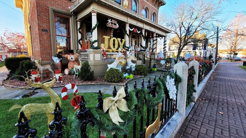 Many homes in German Village are decorated for Saturday's Light Up German Village, which will operate from 6-9 p.m. NICK GRAHAM / STAFF