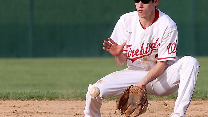 Lakota West second baseman Frankie Schmitt fields a Hamilton ground ball during their game in West Chester Township on April 2. CONTRIBUTED PHOTO BY E.L. HUBBARD