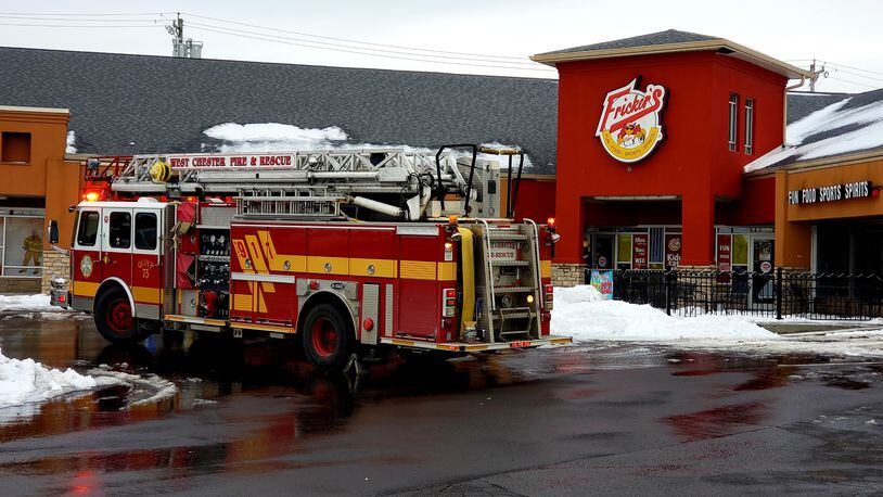 West Chester Fire Department responds to Fricker’s restaurant at 7844 Kingland Drive in West Chester Twp. for a report of a partial ceiling collapse Tuesday, Jan. 22, 2019. NICK GRAHAM/STAFF