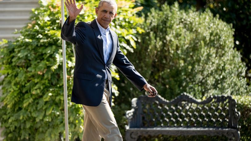 President Barack Obama waves as he walks to Marine One on the South Lawn of the White House in Washington, Tuesday, Aug. 23, 2016, for a short trip to Andrews Air Force Base, Md., then onto Baton Rouge, La., where he will get a first-hand look at the impact of recent devastating floods. (AP Photo/Andrew Harnik)