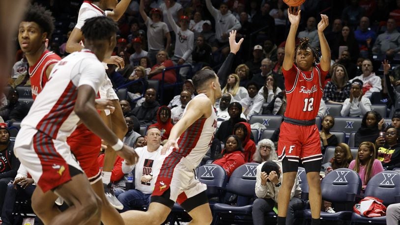 Fairfield's Michael Lewis hits a three-point basket during their Division I regional semifinal basketball game against Princeton Wednesday, March 8, 2023 at Xavier University's Cintas Center. Fairfield won 51-45. NICK GRAHAM/STAFF
