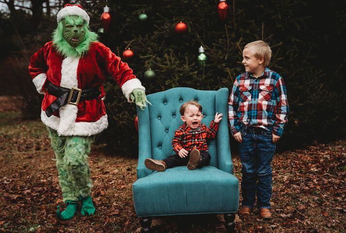 Photos: The Grinch surprises, scares children during photo shoot