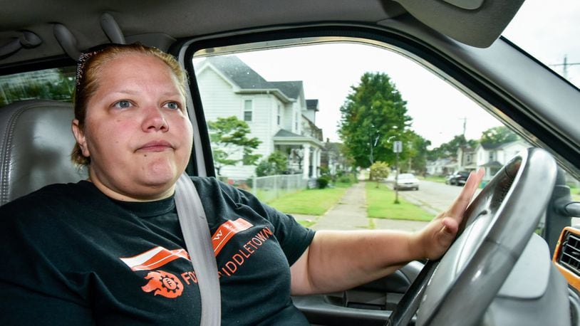 Jeri Lewis, a self-described missionary, spends time driving around Middletown communities looking for people to talk to, pray for and help out along her travels. NICK GRAHAM/STAFF