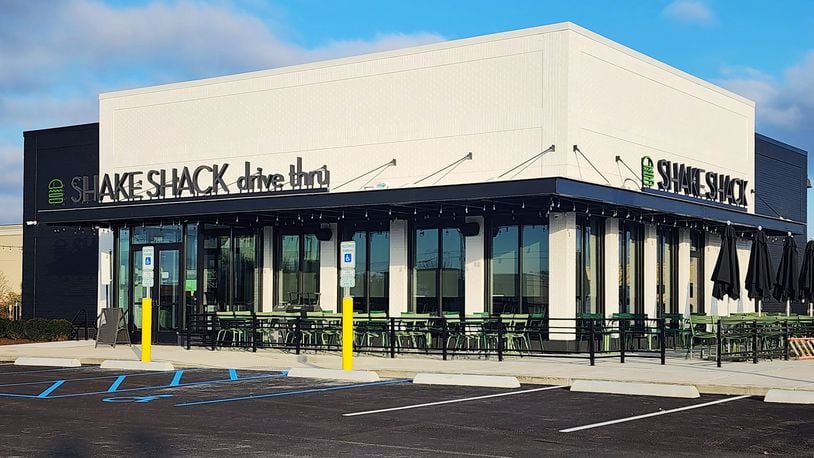 A newcomer to southwest Ohio’s burger wars is about to shake things up. The popular Shake Shack restaurant, which has a loyal national following for its high-end, fast-food fare, will soon be opening its first Greater Cincinnati location in Liberty Twp. The eatery is tentatively scheduled to open Dec. 7 at the high-profile Liberty Center site, just off of the Liberty Way and Interstate 75 interchange in Butler County. NICK GRAHAM/JOURNAL-NEWS
