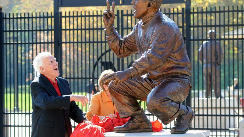 Ara Parseghian reacts at the unveiling of his statue during a ceremony for the Cradle of Coaches before Miami University’s football game against Army on Saturday, Oct. 8, 2011 at Yager Stadium in Oxford. The RedHawks defeated Army 35-28. Staff photo by Samantha Grier.