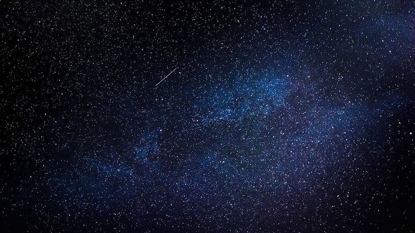 Stock photo of a meteor in the night sky.