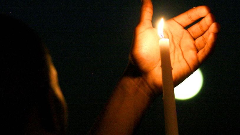 Butler County community leaders are holding a community candlelight vigil tonight, Aug. 18, to honor those killed and injured last weekend in Charlottesville, Va. STAFF FILE PHOTO