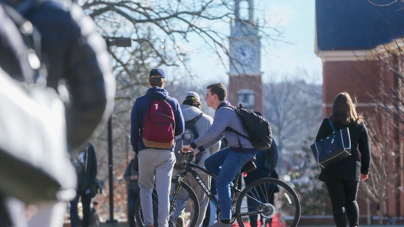 Students walk through the campus of Miami University in Oxford on Feb. 15. Ohio State University and Miami University, which is Butler County’s largest employer, added more students between spring 2016 and spring 2017 than any other state institutions. GREG LYNCH / STAFF