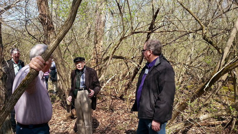 Orie Loucks is shown last April conducting a tour of spring flowers on Easter in the woods of Hopedale Unitarian Universalist Community where the trail is being dedicated in his memory as the Orie Loucks Woodland Trail. CONTRIBUTED
