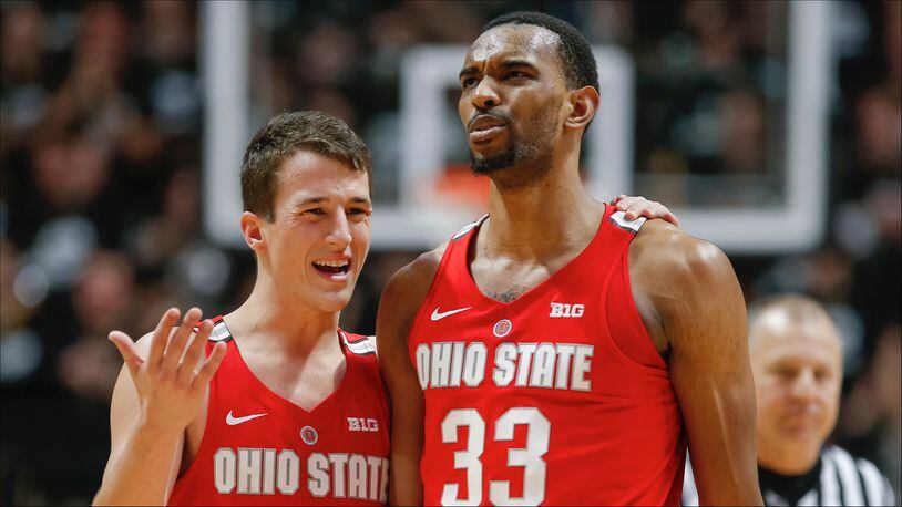WEST LAFAYETTE, IN - FEBRUARY 07: Andrew Dakich #13 and Keita Bates-Diop #33 of the Ohio State Buckeyes talk during a stop in action against the Purdue Boilermakers at Mackey Arena on February 7, 2018 in West Lafayette, Indiana. (Photo by Michael Hickey/Getty Images)