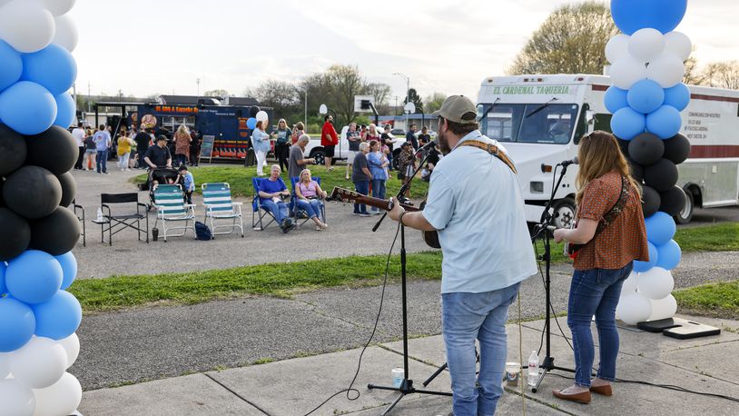 Middletown held their first gathering at the Food Truck Park at Lefferson Park Friday, April, 14, 2023. different food trucks with be at the park every other Friday through September 15 from 4-8 p.m. with musical performances. Melissa And Justin Murphy of Live Past Life performed during this event. NICK GRAHAM/STAFF