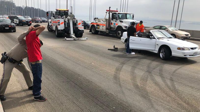 A driver suspected of being part of a sideshow that closed a bridge in San Francisco Sunday was arrested when his car became disabled. (Photo: California Highway Patrol/Twitter)