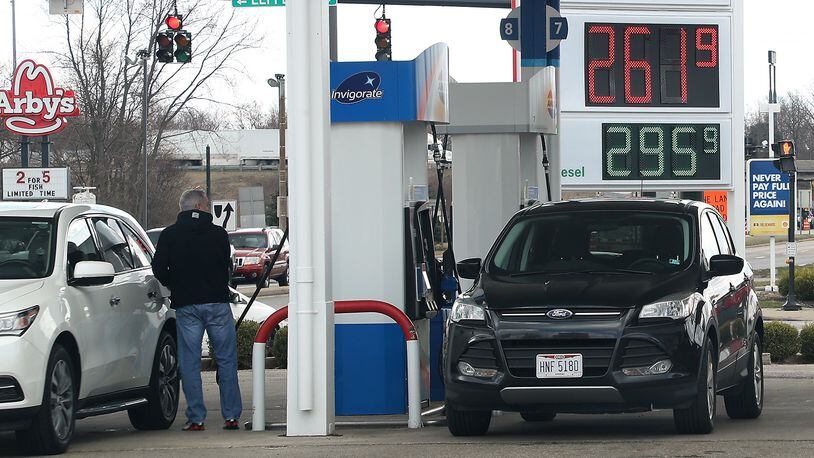 Gas prices are declining in wake of tensions between the U.S. and China. BILL LACKEY/STAFF