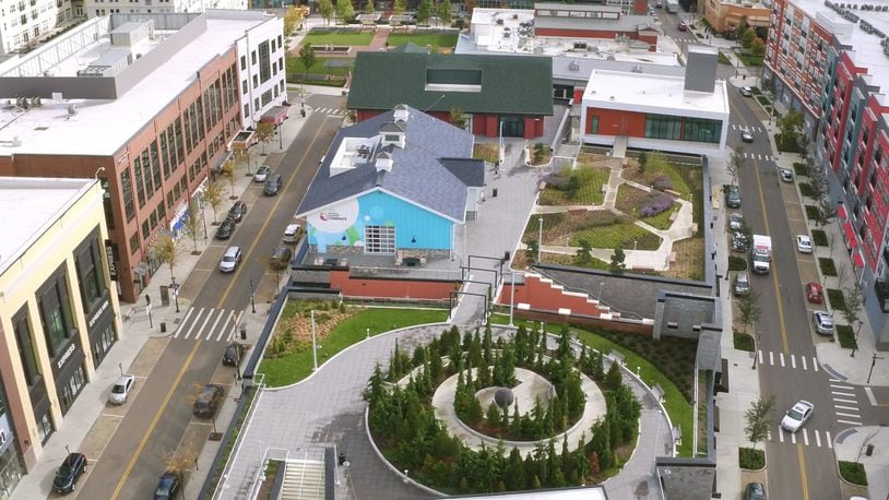 Liberty Center has applied for Designated Outdoor Refreshment Area (DORA) status with the township. This rooftop garden at Liberty Center has a spiral walkway, Sabin Hall, TriHealth Triumph gardens and Unity Chapel and Kona Grill near The Square. TY GREENLEES / STAFF