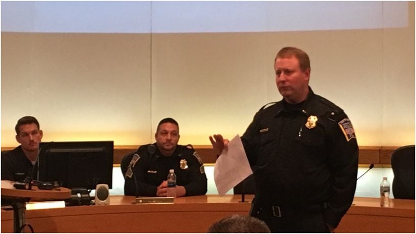 Lt. David Birk of the Middletown Division of Police addressed members of the church community Friday afternoon to discuss ways to better secure their buildings. Detective Brandon Highley and Sgt. Sam Allen also spoke. RICK McCRABB/STAFF