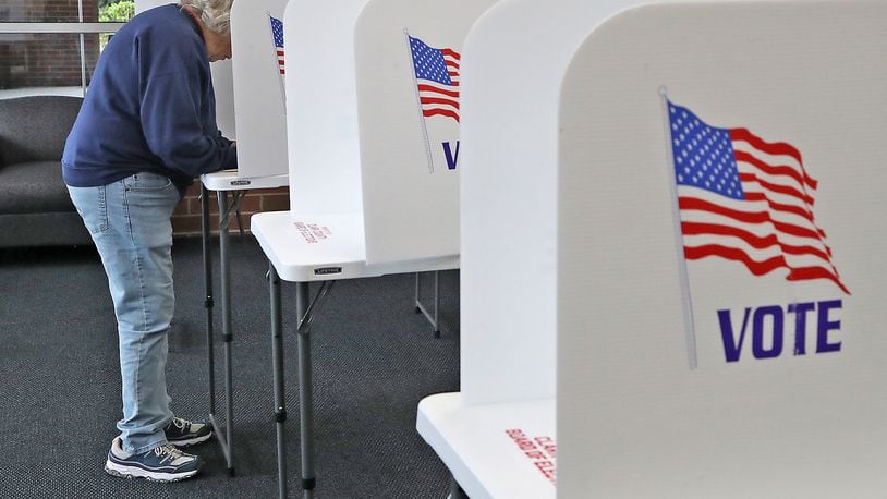 FILE PHOTO: Voters cast their votes at a Springfield election poll Tuesday, May 3, 2022. BILL LACKEY/STAFF