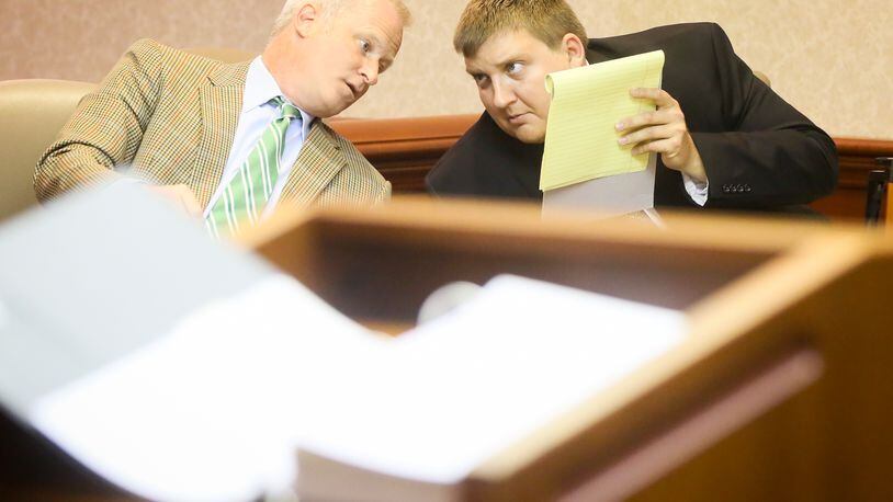 Fairfield teacher Tyler Conrad sits with his attorney Christopher Pagan during testimony in his trial, Monday, May 22. A 16-year-old Fairfield High School student testified for more than 90 minutes that Conrad touched her inappropriately in his classroom and at a Ross Twp. home. GREG LYNCH / STAFF