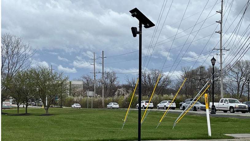 Lebanon City Council approved a new city policy on how automatic license plate readers would be used. In a split vote, council voted 4-3 to approve the policy. City officials said it will be several months before the cameras could be erected around the city entry points. This camera is located at northeast corner of Mason-Montgomery and Socialville-Foster roads in Mason.  ED RICHTER/STAFF