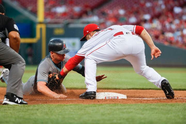 PHOTOS: Zack Cozart only positive in Reds’ loss