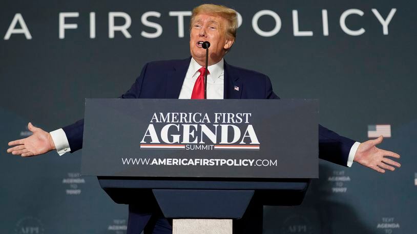 FILE - Former President Donald Trump speaks at an America First Policy Institute agenda summit at the Marriott Marquis in Washington, July 26, 2022. A group trying to lay the groundwork for a second Trump administration if the former president wins in November is out with a new policy book that aims to articulate an "America First" national security agenda. (AP Photo/Andrew Harnik, File)