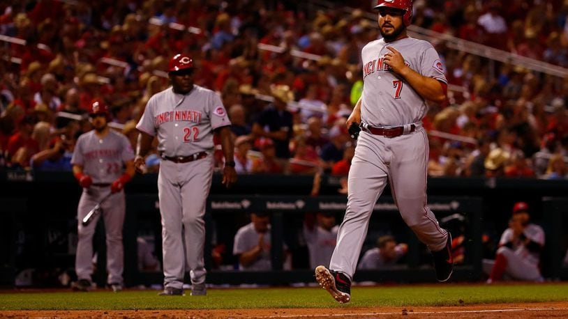 ST. LOUIS, MO - JULY 13:  Eugenio Suarez #7 of the Cincinnati Reds scores a run against the St. Louis Cardinals in the eighth inning at Busch Stadium on July 13, 2018 in St. Louis, Missouri.  (Photo by Dilip Vishwanat/Getty Images)