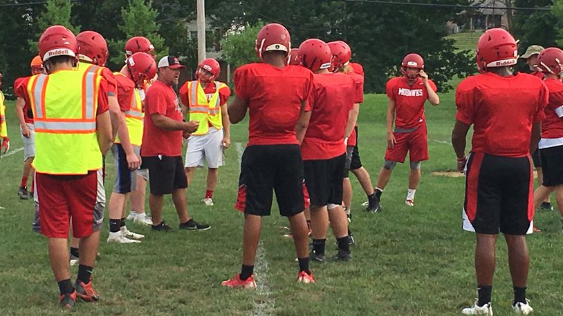 Madison coach Steve Poff directs his team during a recent practice at the school. RICK CASSANO/STAFF