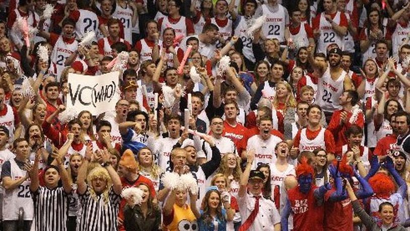Fans in the student section cheer for Dayton during a game against Virginia Commonwealth on Saturday, March 5, 20126, at UD Arena in Dayton. David Jablonski/Staff