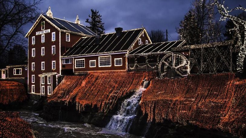 The Legendary Lights at the Historic Clifton Mill drapes their scenic features cliffs, gorges, a covered bridge and more in four million brilliant lights.