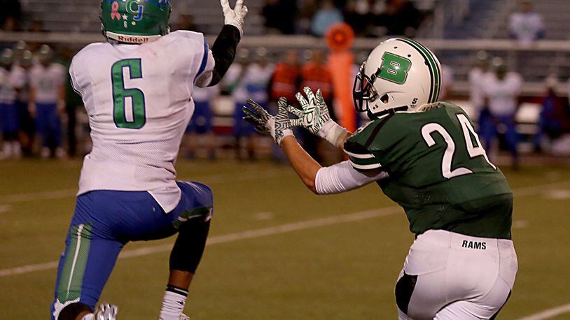 Chaminade Julienne’s Darian Jones intercepts a pass intended for Badin’s Evan Grawe during their game at Virgil Schwarm Stadium in Hamilton on Saturday night. CONTRIBUTED PHOTO BY E.L. HUBBARD