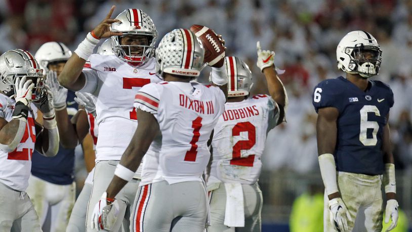 STATE COLLEGE, PA - SEPTEMBER 29:  Dwayne Haskins #7 of the Ohio State Buckeyes celebrates with Johnnie Dixon #1 after defeating the Penn State Nittany Lions  on September 29, 2018 at Beaver Stadium in State College, Pennsylvania.  (Photo by Justin K. Aller/Getty Images)