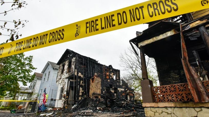 Three homes were burned in a fire in the 600 block of Ludlow Street in Hamilton that was first reported at 1:11 a.m. on Wednesday, May 6, 2020. NICK GRAHAM / STAFF