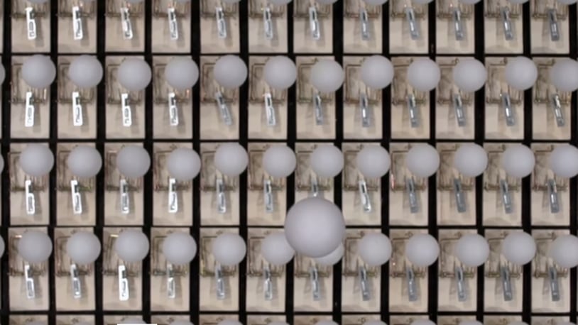 Each trap has its own ping pong ball precariously balanced on top. As the single ball drops, it sets off a chain reaction, causing the balls to fly in all directions. One small ball caused a ripple effect of chaos and destruction.
