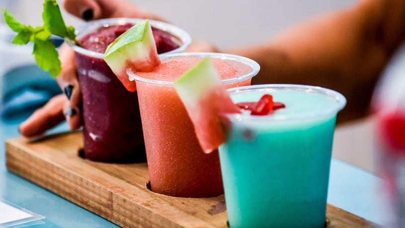 The Frost Factory, which serves boozy and non-alcoholic slushy options, will open a new location this spring at Miami Twp.’s Austin Landing. The business creates beverages using fresh fruit, and alcohol can be included for customers of age. STAFF FILE PHOTO