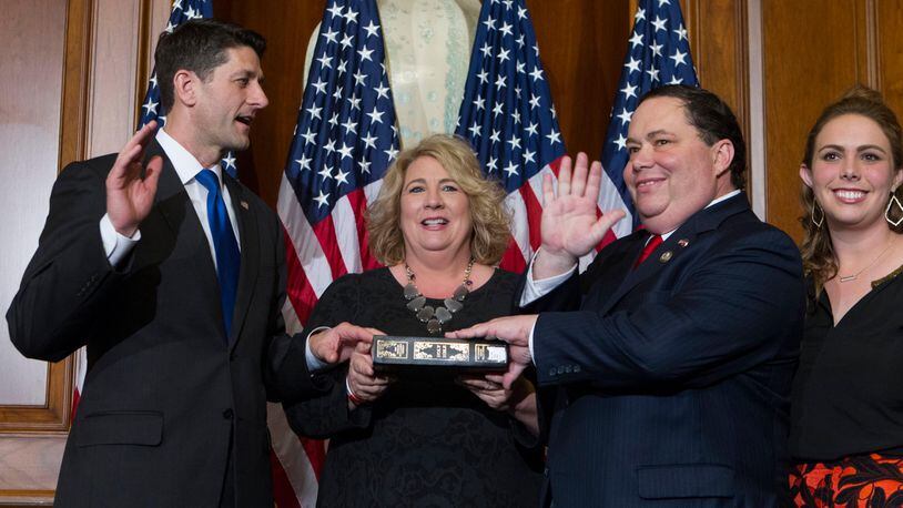 In this Jan. 3, 2017, file photo, House Speaker Paul Ryan of Wis. administers the House oath of office to Rep. Blake Farenthold, R-Texas, during a mock swearing in ceremony on Capitol Hill in Washington. The House Ethics Committee said Dec. 7 it is expanding its investigation into sexual harassment allegations against Farenthold. The committee said it will investigate whether Farenthold sexually harassed a former member of his staff and retaliated against her for complaining. The committee also said the panel would review allegations that Farenthold made inappropriate statements to other members of his official staff. ( AP Photo/Jose Luis Magana, File)